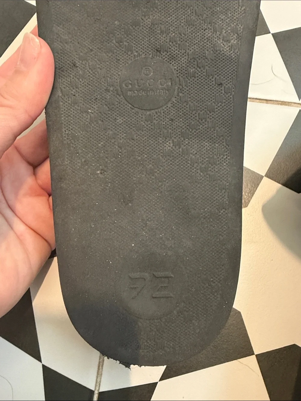 Gucci Black Embossed Logo Rubber Slide Sandals